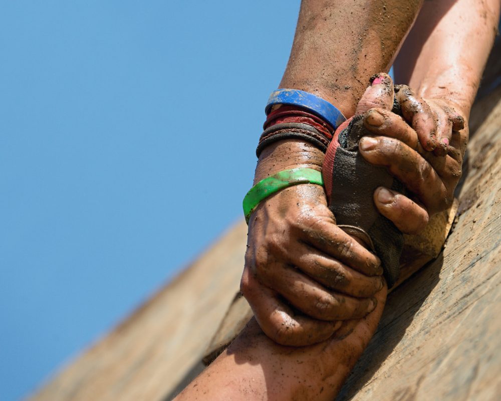 Couple,Hold,Hands,help,When,Overcoming,Hindrances,Mud